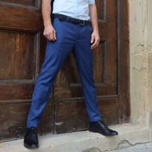 a man standing in front of a wooden door